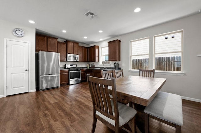 328 Triumph Rd, Buda, TX 78610 - dining space featuring recessed lighting, dark wood-style flooring, and baseboards