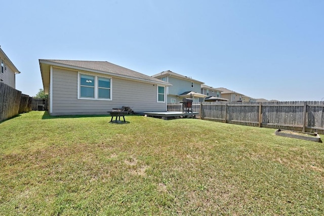 328 Triumph Rd, Buda, TX 78610 - rear view of house featuring a wooden deck
