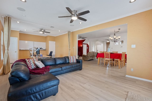 11713 Rydalwater Ln, Austin, TX 78754 - living room featuring ceiling fan, light wood-style floors, crown molding, a chandelier, and recessed lighting