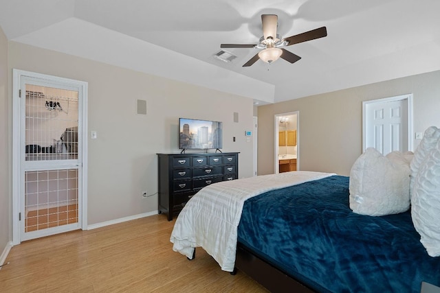 11713 Rydalwater Ln, Austin, TX 78754 - bedroom featuring light wood-type flooring, baseboards, ensuite bath, and a ceiling fan