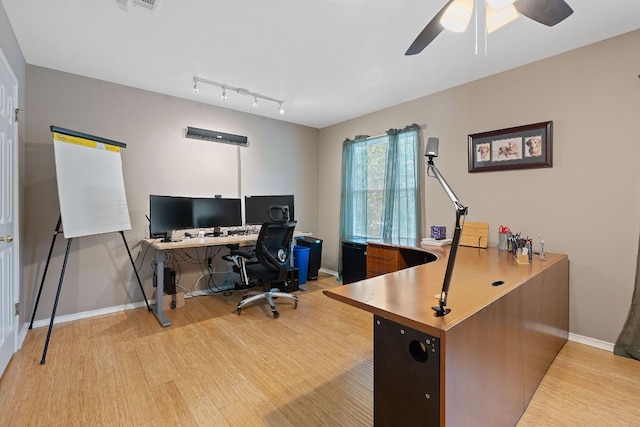 11713 Rydalwater Ln, Austin, TX 78754 - office space with light wood-type flooring, a ceiling fan, and baseboards