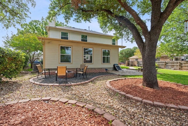 11713 Rydalwater Ln, Austin, TX 78754 - rear view of house with a patio area and a chimney