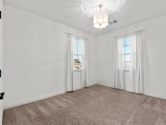 307 Ansley Cv, Lakeway, TX 78738 - carpeted empty room featuring a chandelier and baseboards
