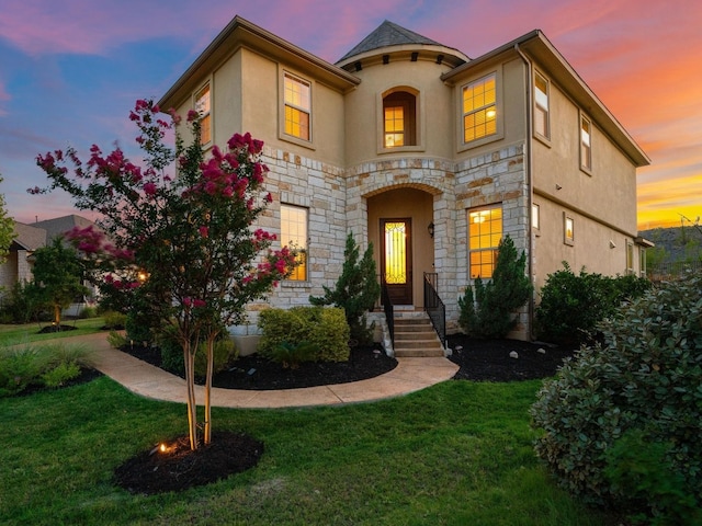 307 Ansley Cv, Lakeway, TX 78738 - view of front of property with stone siding, stucco siding, and a lawn