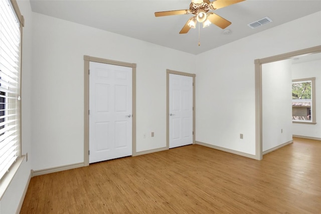 242 Meadow Lake Dr, Seguin, TX 78155 - unfurnished bedroom featuring light wood-type flooring and baseboards