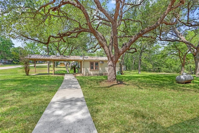 242 Meadow Lake Dr, Seguin, TX 78155 - ranch-style house featuring a front yard