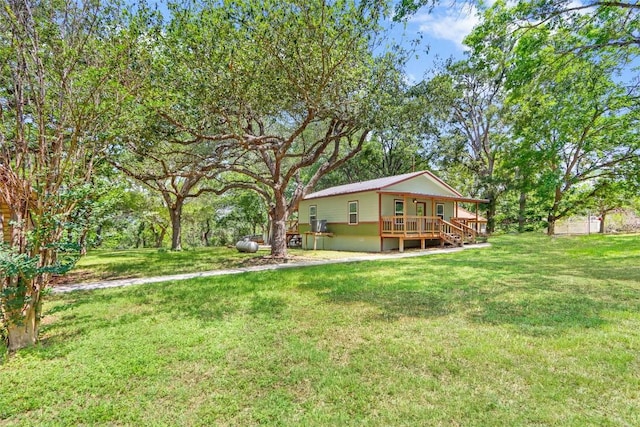242 Meadow Lake Dr, Seguin, TX 78155 - view of green lawn featuring covered porch