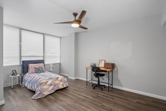 1800 Lavaca St Unit 307, Austin, TX 78701 - bedroom featuring wood finished floors, an office area, and ceiling fan