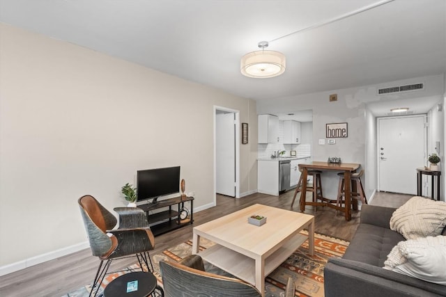 1800 Lavaca St Unit 307, Austin, TX 78701 - living area featuring wood finished floors