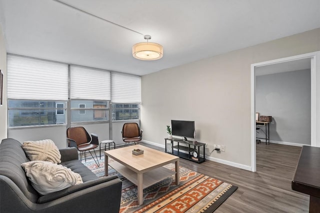 1800 Lavaca St Unit 307, Austin, TX 78701 - living room with wood finished floors and baseboards