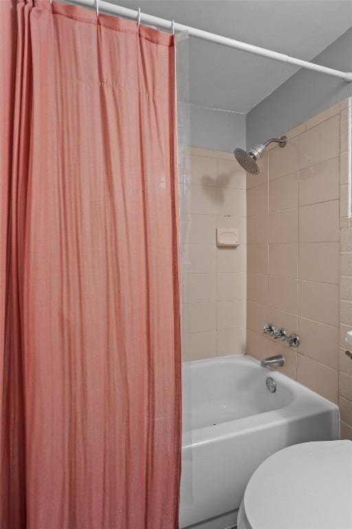 1800 Lavaca St Unit 307, Austin, TX 78701 - full bathroom featuring toilet and shower / bath combo