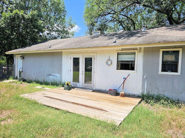 105 Park Dr S, Kyle, TX 78640 - back of property with a deck and french doors