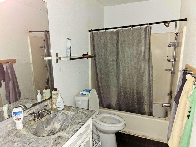 105 Park Dr S, Kyle, TX 78640 - full bath with vanity, shower / tub combo with curtain, and toilet