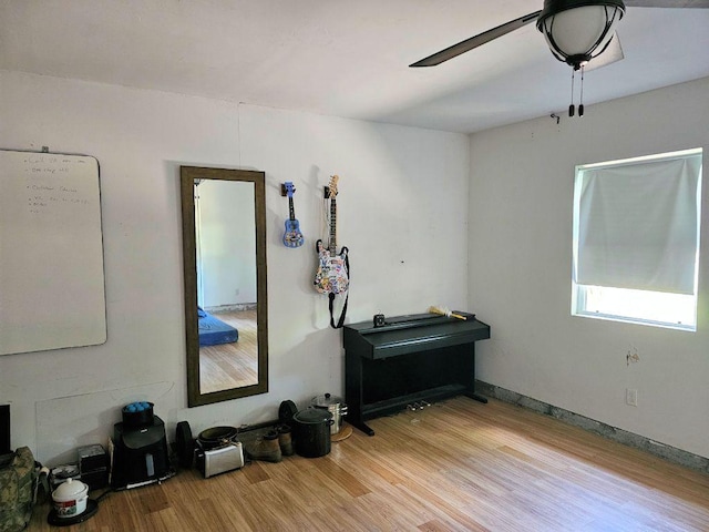 105 Park Dr S, Kyle, TX 78640 - miscellaneous room with a ceiling fan and wood finished floors
