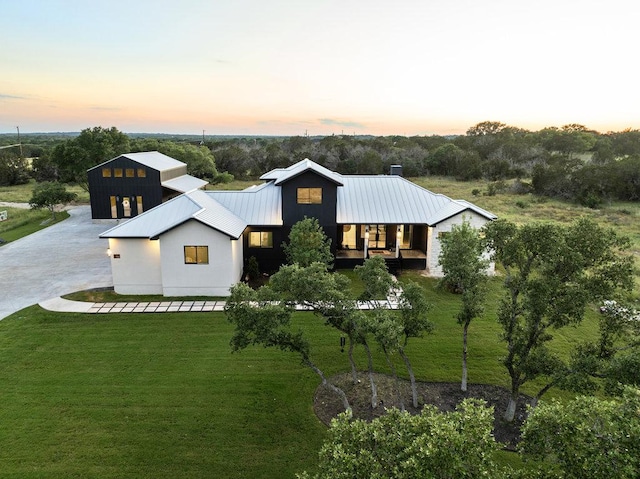 150 Wandering Oak Cir, Burnet, TX 78611 - view of front of property featuring a yard and metal roof