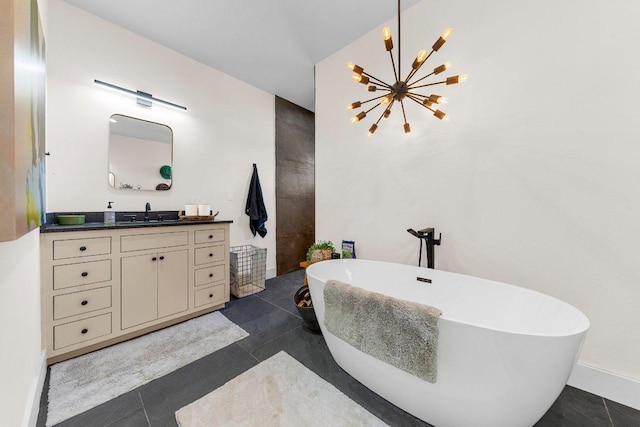 150 Wandering Oak Cir, Burnet, TX 78611 - bathroom with vanity, a soaking tub, tile patterned flooring, and a chandelier