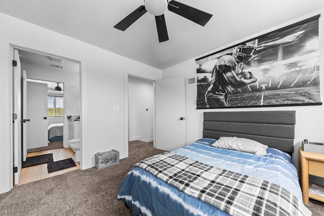 150 Wandering Oak Cir, Burnet, TX 78611 - carpeted bedroom with ensuite bathroom, ceiling fan, and lofted ceiling