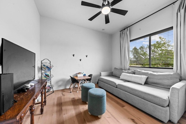 150 Wandering Oak Cir, Burnet, TX 78611 - living room with a ceiling fan and wood finished floors