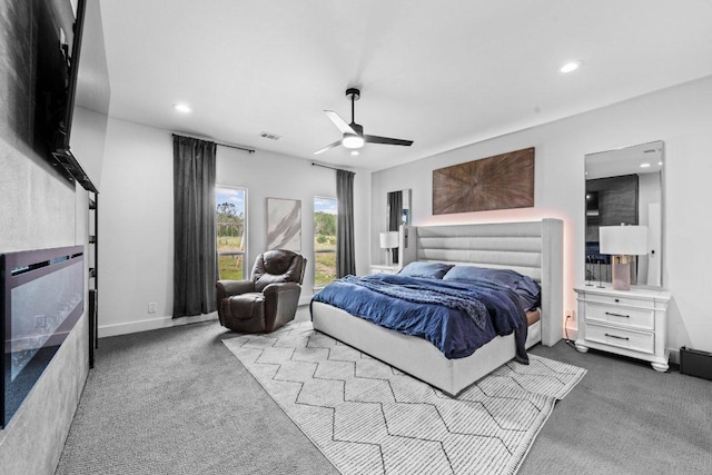 150 Wandering Oak Cir, Burnet, TX 78611 - carpeted bedroom with recessed lighting and a ceiling fan