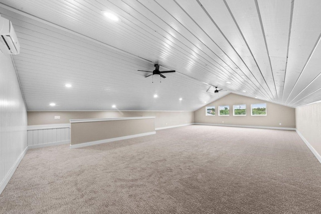 150 Wandering Oak Cir, Burnet, TX 78611 - additional living space with lofted ceiling, carpet, an AC wall unit, ceiling fan, and recessed lighting