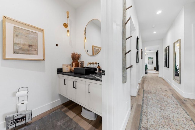 150 Wandering Oak Cir, Burnet, TX 78611 - hall featuring light wood-type flooring and recessed lighting