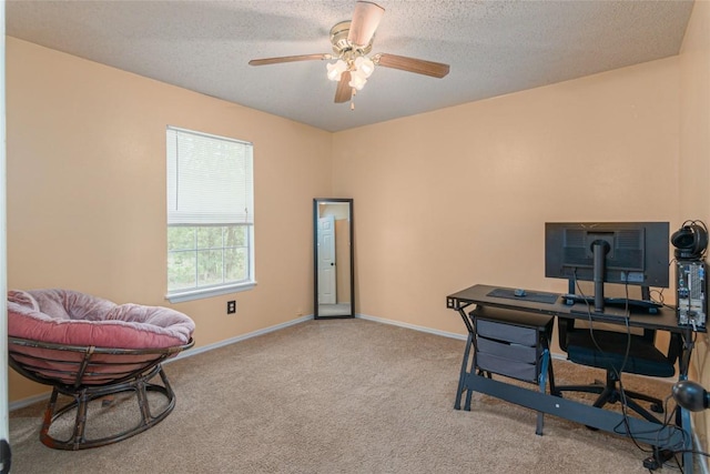 926 Zwicke St, Seguin, TX 78155 - office area featuring carpet flooring, ceiling fan, and a textured ceiling