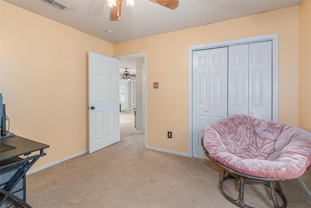 926 Zwicke St, Seguin, TX 78155 - sitting room with a ceiling fan and carpet floors