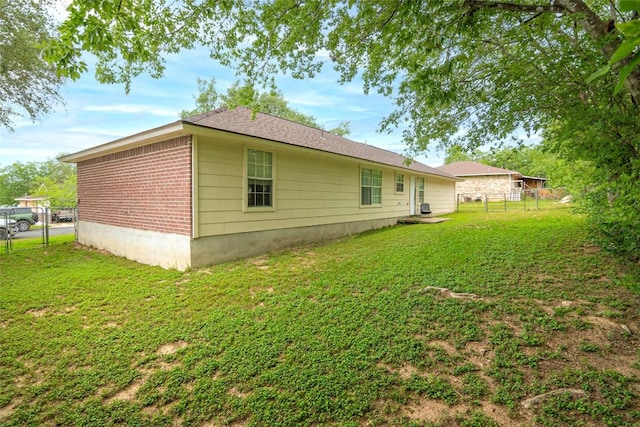 926 Zwicke St, Seguin, TX 78155 - rear view of property featuring brick siding