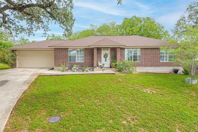 926 Zwicke St, Seguin, TX 78155 - ranch-style house with an attached garage, concrete driveway, brick siding, and a front yard