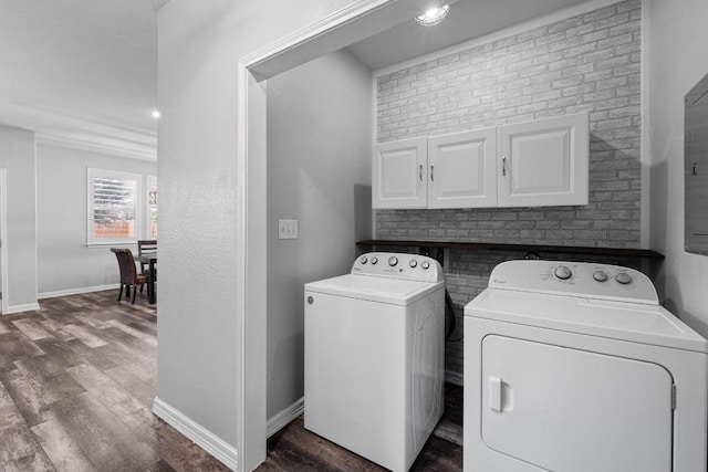 529 Cinnamon Teal Ln, Leander, TX 78641 - laundry room featuring independent washer and dryer, dark wood-style floors, baseboards, and cabinet space