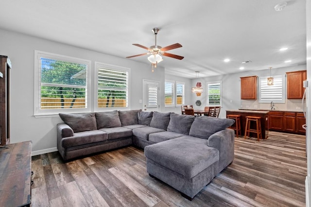 529 Cinnamon Teal Ln, Leander, TX 78641 - living area featuring ceiling fan, dark wood-style floors, recessed lighting, and baseboards
