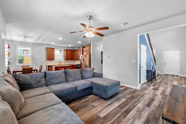 529 Cinnamon Teal Ln, Leander, TX 78641 - living area featuring wood finished floors, a ceiling fan, recessed lighting, and baseboards