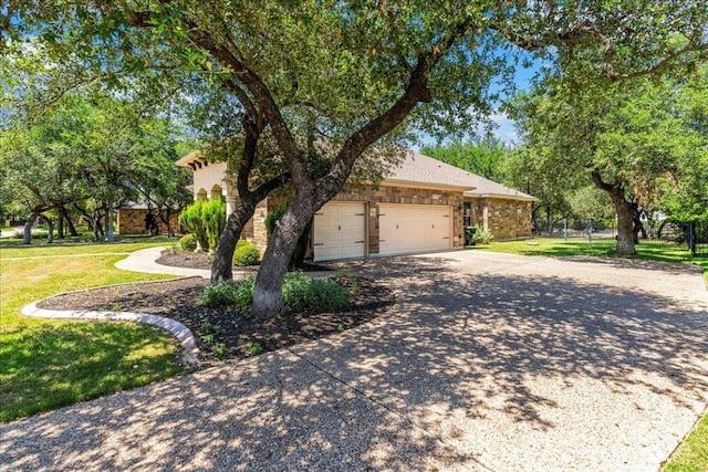 118 NE Verrena Way, Georgetown, TX 78628 - view of front of house featuring concrete driveway and a garage
