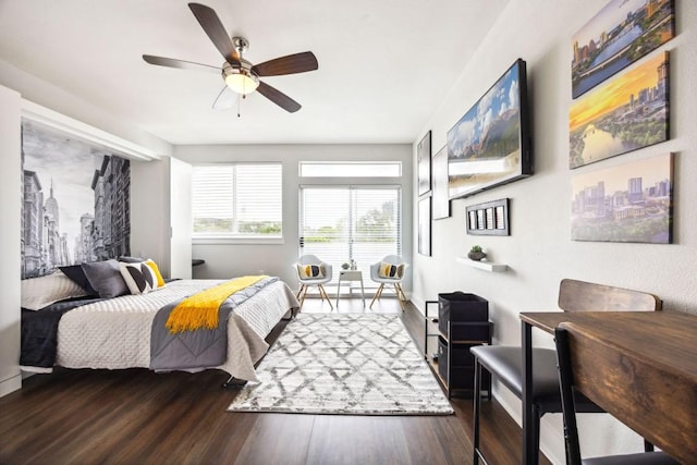 3114 S Congress Ave Unit 304, Austin, TX 78704 - bedroom with wood finished floors and a ceiling fan
