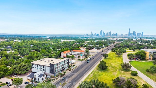3114 S Congress Ave Unit 304, Austin, TX 78704 - bird's eye view of city skyline and a tree filled landscape