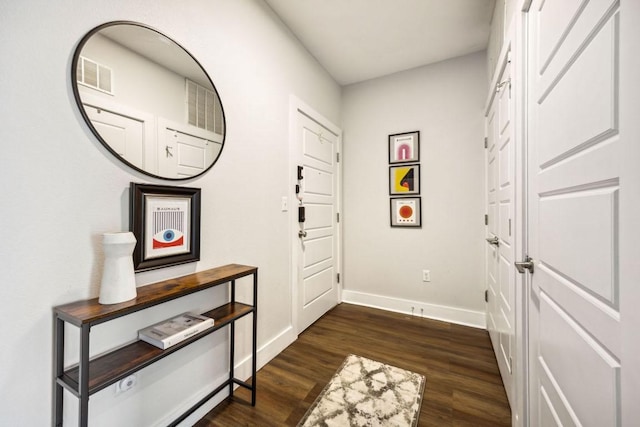 3114 S Congress Ave Unit 304, Austin, TX 78704 - doorway to outside featuring baseboards and dark wood-style floors