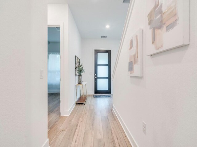 1108 Floradale Dr, Austin, TX 78753 - hall with light wood-style flooring, baseboards, and recessed lighting