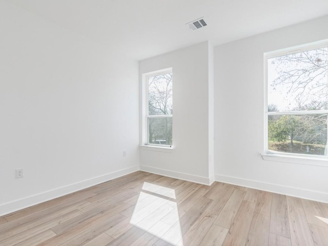 1108 Floradale Dr, Austin, TX 78753 - unfurnished room with light wood-type flooring and baseboards