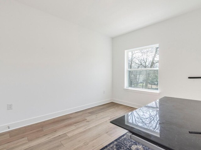 1108 Floradale Dr, Austin, TX 78753 - bedroom with wood finished floors and baseboards