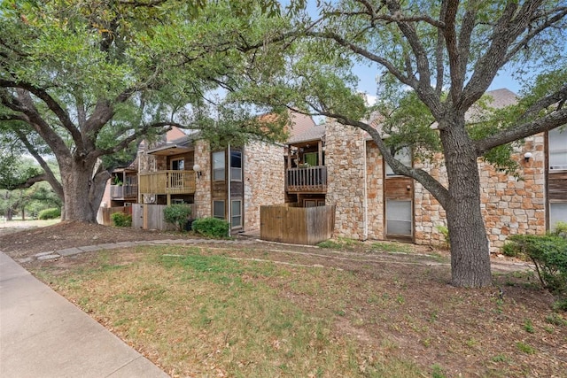 6903 Deatonhill Dr Unit 15, Austin, TX 78745 - view of front of house with stone siding