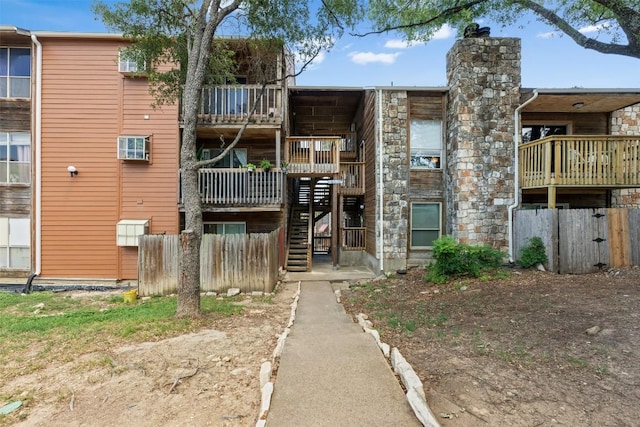 6903 Deatonhill Dr Unit 15, Austin, TX 78745 - view of apartment building / complex featuring stairs