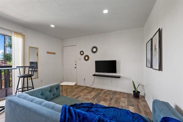 6903 Deatonhill Dr Unit 15, Austin, TX 78745 - living area featuring wood finished floors, recessed lighting, and baseboards
