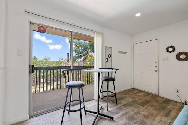 6903 Deatonhill Dr Unit 15, Austin, TX 78745 - foyer featuring wood finished floors and recessed lighting