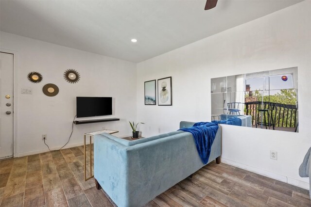 6903 Deatonhill Dr Unit 15, Austin, TX 78745 - living area featuring wood finished floors, ceiling fan, recessed lighting, and baseboards