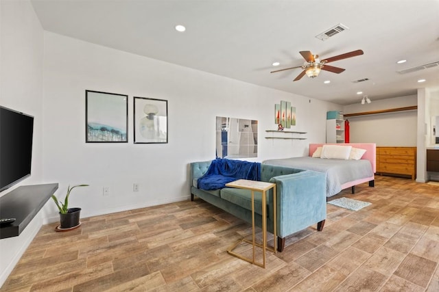 6903 Deatonhill Dr Unit 15, Austin, TX 78745 - bedroom with light wood-style flooring, recessed lighting, baseboards, and a ceiling fan