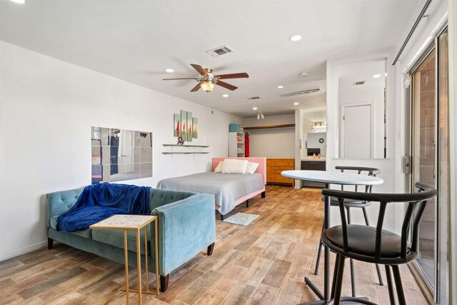 6903 Deatonhill Dr Unit 15, Austin, TX 78745 - bedroom featuring light wood-style floors and recessed lighting