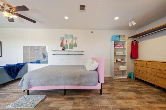 6903 Deatonhill Dr Unit 15, Austin, TX 78745 - bedroom featuring wood finished floors, recessed lighting, and ceiling fan
