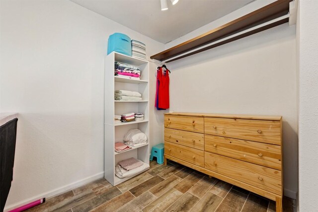 6903 Deatonhill Dr Unit 15, Austin, TX 78745 - walk in closet featuring wood tiled floors
