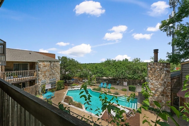 6903 Deatonhill Dr Unit 15, Austin, TX 78745 - view of swimming pool with a patio
