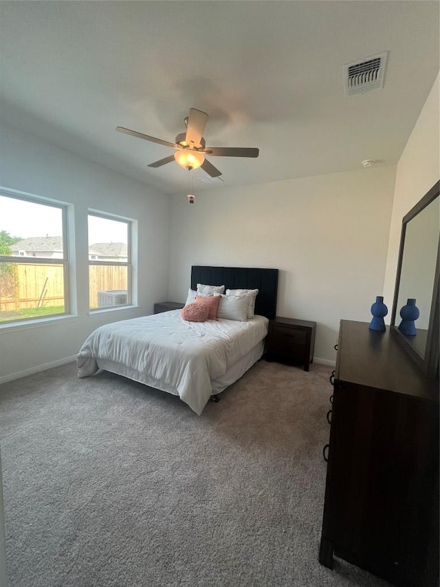 316 Witchhazel Way, San Marcos, TX 78666 - carpeted bedroom with baseboards and a ceiling fan
